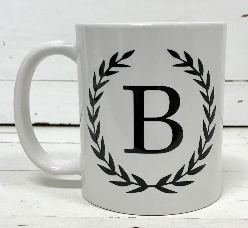 http://initiallyblessed.com/cdn/shop/products/Mug_11_Oz._With_Initial_in_Laurels_1200x1200.jpg?v=1527561603